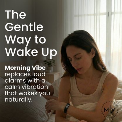 A woman sits on the edge of a bed, looking at the Morning Vibe Vibrating Wrist Alarm on her wrist. Text reads: The Gentle Way to Wake Up. Morning Vibe Vibrating Wrist Alarm replaces loud alarms with a silent vibration, waking you naturally. Morning Vibe logo in the corner.